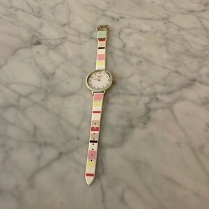 Kate Spade Watch - never worn. Silicone type band, comfortable and light.